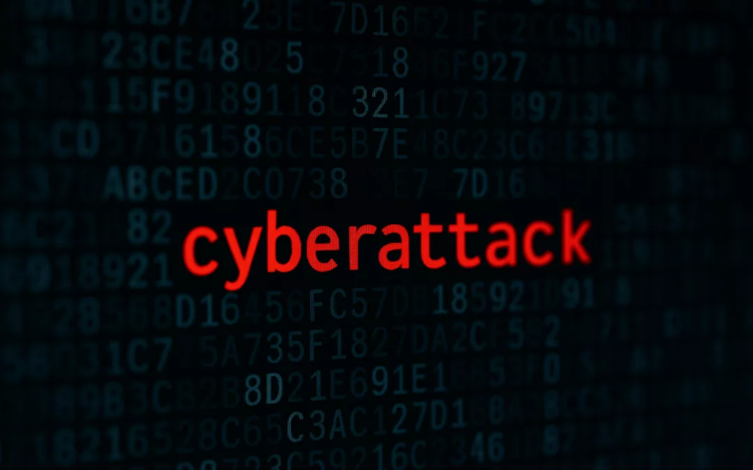 Écran d’ordinateur affichant un fond sombre avec du code numérique flouté et un point rouge lumineux évoquant une activité informatique suspecte.